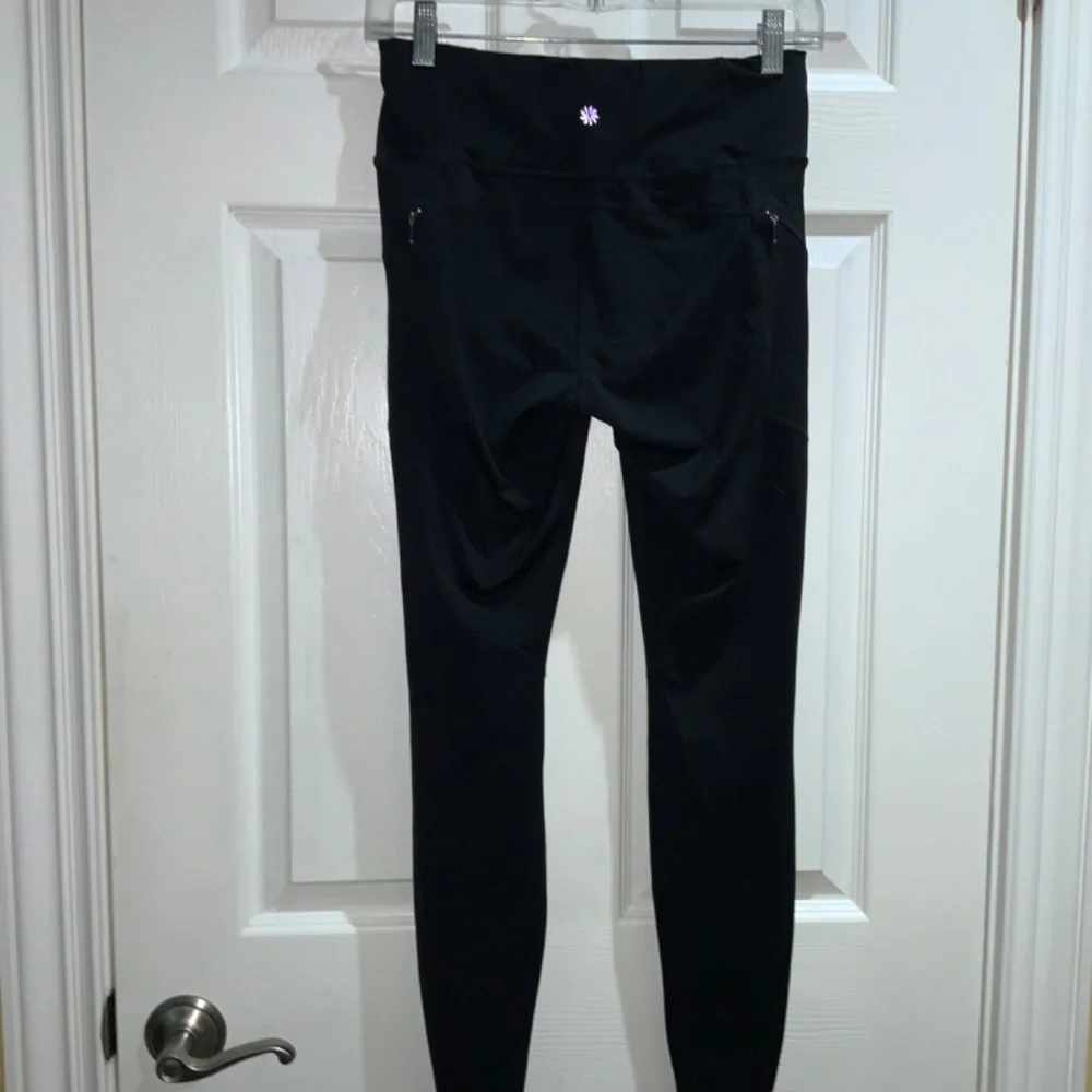 Athleta black leggings Sz S athletic athleisure yoga zippered pockets
